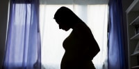 silhouette of pregnant woman