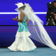 Naomi Osaka makes grand entrance and big fashion statement at Australian Open