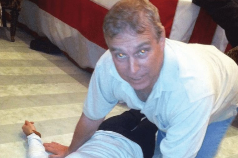 A photograph from the latest Epstein document release appears to show Andrew Mountbatten-Windsor kneeling over an unknown woman.