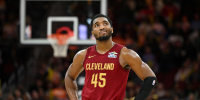 CLEVELAND, OHIO - JANUARY 04: Donovan Mitchell #45 of the Cleveland Cavaliers looks on during the second half against the Detroit Pistons at Rocket Arena on January 04, 2026 in Cleveland, Ohio. NOTE TO USER: User expressly acknowledges and agrees that, by downloading and or using this photograph, User is consenting to the terms and conditions of the Getty Images License Agreement. (Photo by Nick Cammett/Getty Images)
