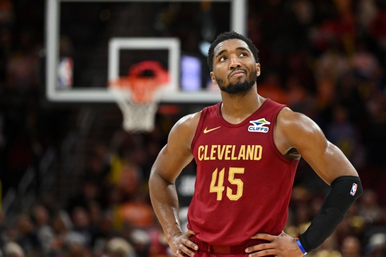 CLEVELAND, OHIO - JANUARY 04: Donovan Mitchell #45 of the Cleveland Cavaliers looks on during the second half against the Detroit Pistons at Rocket Arena on January 04, 2026 in Cleveland, Ohio. NOTE TO USER: User expressly acknowledges and agrees that, by downloading and or using this photograph, User is consenting to the terms and conditions of the Getty Images License Agreement. (Photo by Nick Cammett/Getty Images)