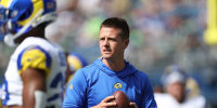SEATTLE, WASHINGTON - SEPTEMBER 10:  Offensive coordinator Mike LaFleur of the Los Angeles Rams works with the team during warmups prior to the game against the Seattle Seahawks at Lumen Field on September 10, 2023 in Seattle, Washington. (Photo by Steph Chambers/Getty Images)
